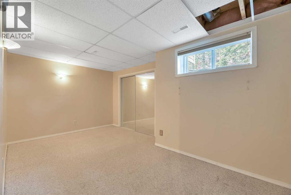 1, 15 Rocky Ridge Gate NW, Calgary, Alberta  T3G 4P6 - Photo 39 - A2321069