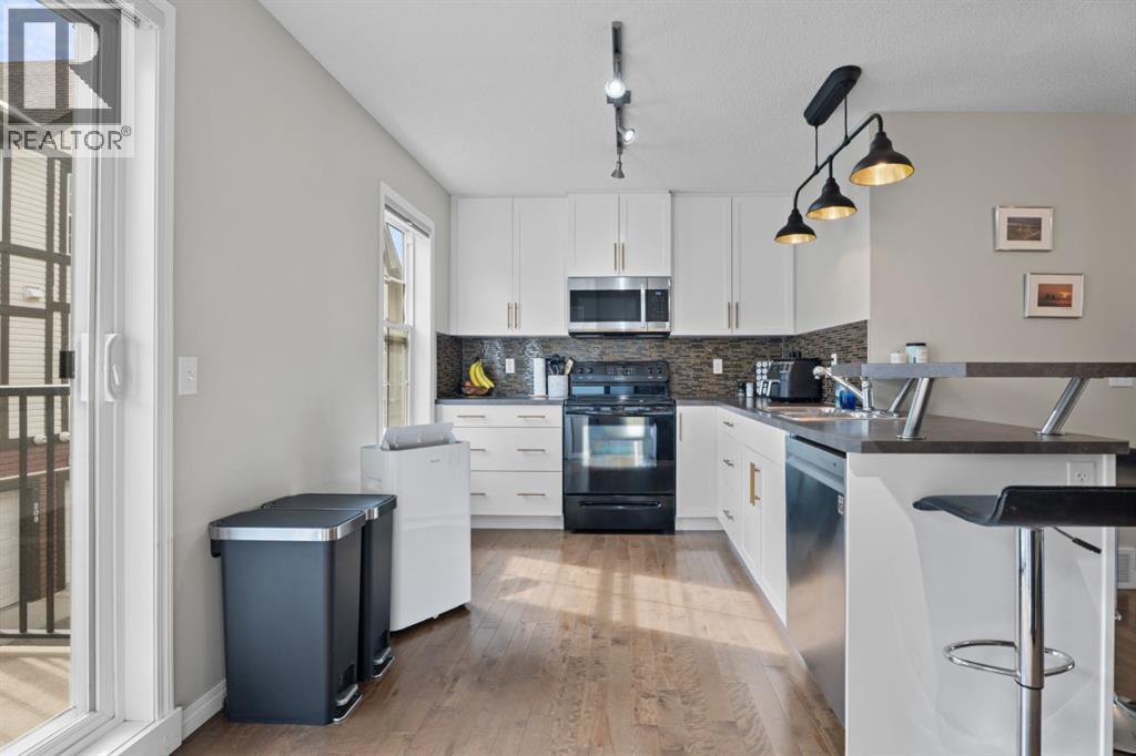 205 New Brighton Villas SE, Calgary, Alberta  T2Z 0T6 - Photo 6 - A2332480