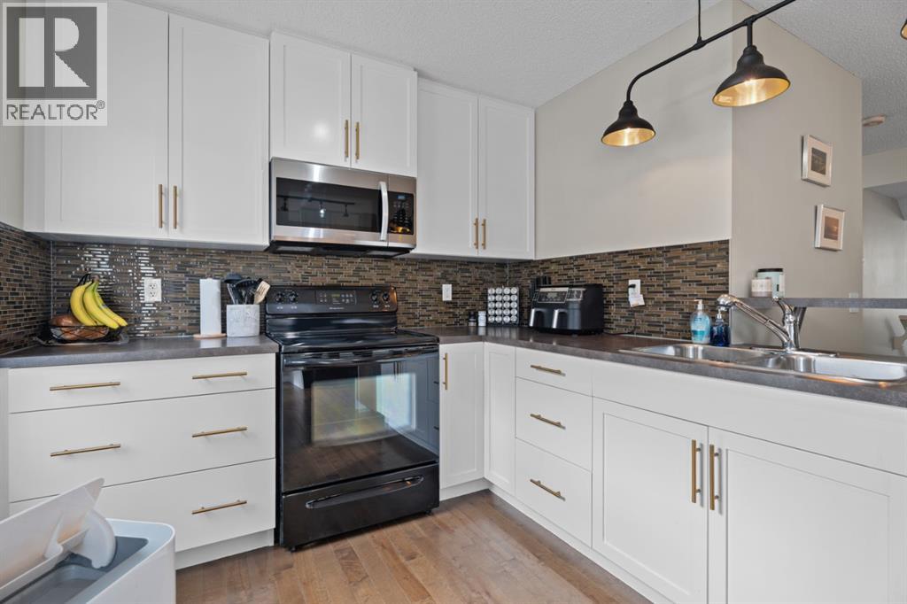 205 New Brighton Villas SE, Calgary, Alberta  T2Z 0T6 - Photo 3 - A2332480