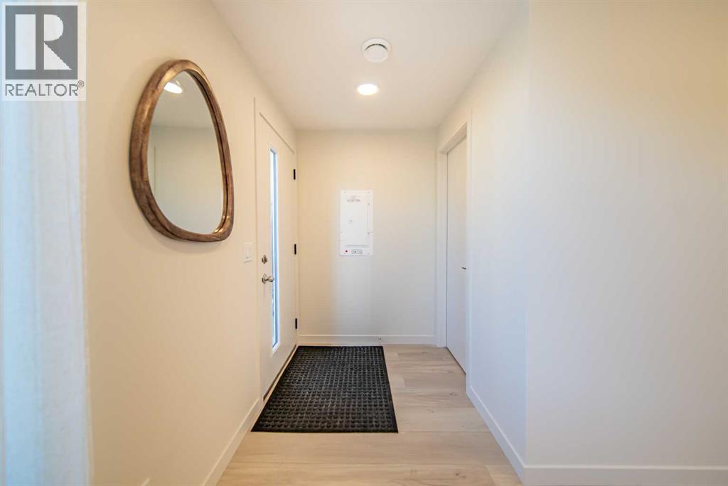 702b, 164 Arbour Lake Court NW, Calgary, Alberta  T3G 0H6 - Photo 2 - A2333754