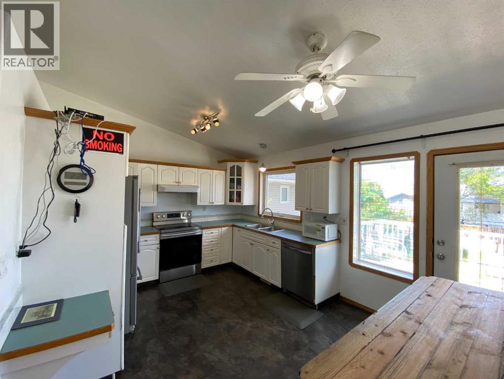 52 Upland Drive W, Brooks, Alberta  T1R 0P5 - Photo 3 - A2319686