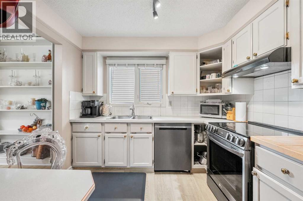 20 Bedwood Hill Ne, Calgary, Alberta  T3K 1L9 - Photo 9 - A2335316