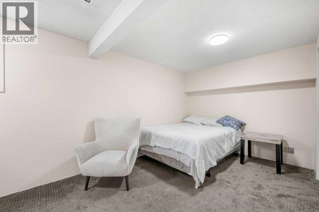 20 Bedwood Hill Ne, Calgary, Alberta  T3K 1L9 - Photo 25 - A2335316