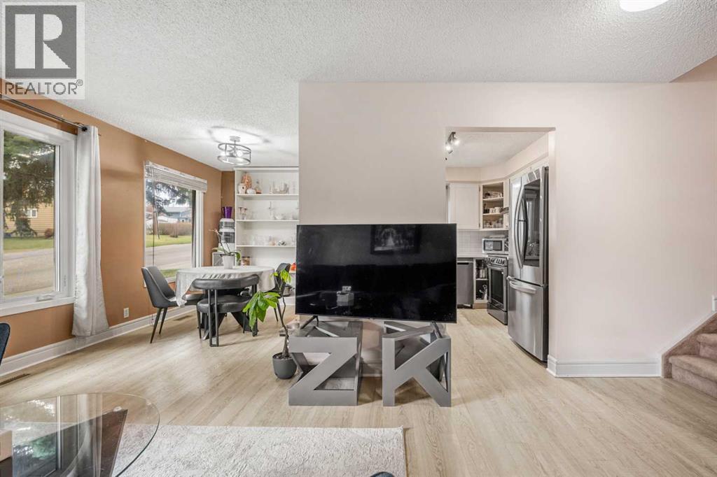 20 Bedwood Hill Ne, Calgary, Alberta  T3K 1L9 - Photo 6 - A2335316