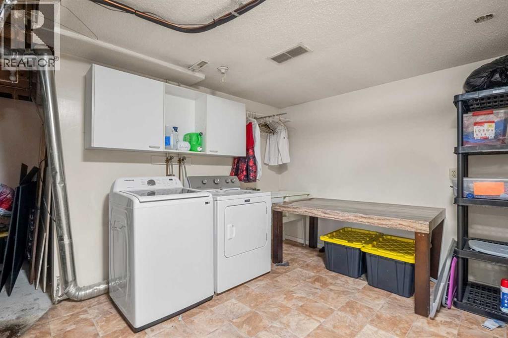 20 Bedwood Hill Ne, Calgary, Alberta  T3K 1L9 - Photo 30 - A2335316