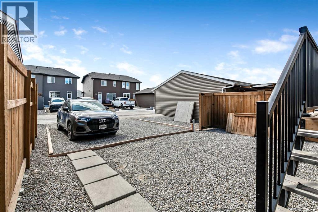 68 Wolf Gate, Okotoks, Alberta  T1S 5T9 - Photo 34 - A2329840