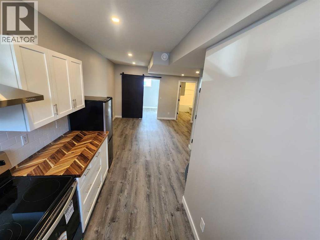 96 Wolf Gate, Okotoks, Alberta  T1S 5T9 - Photo 39 - A2327414