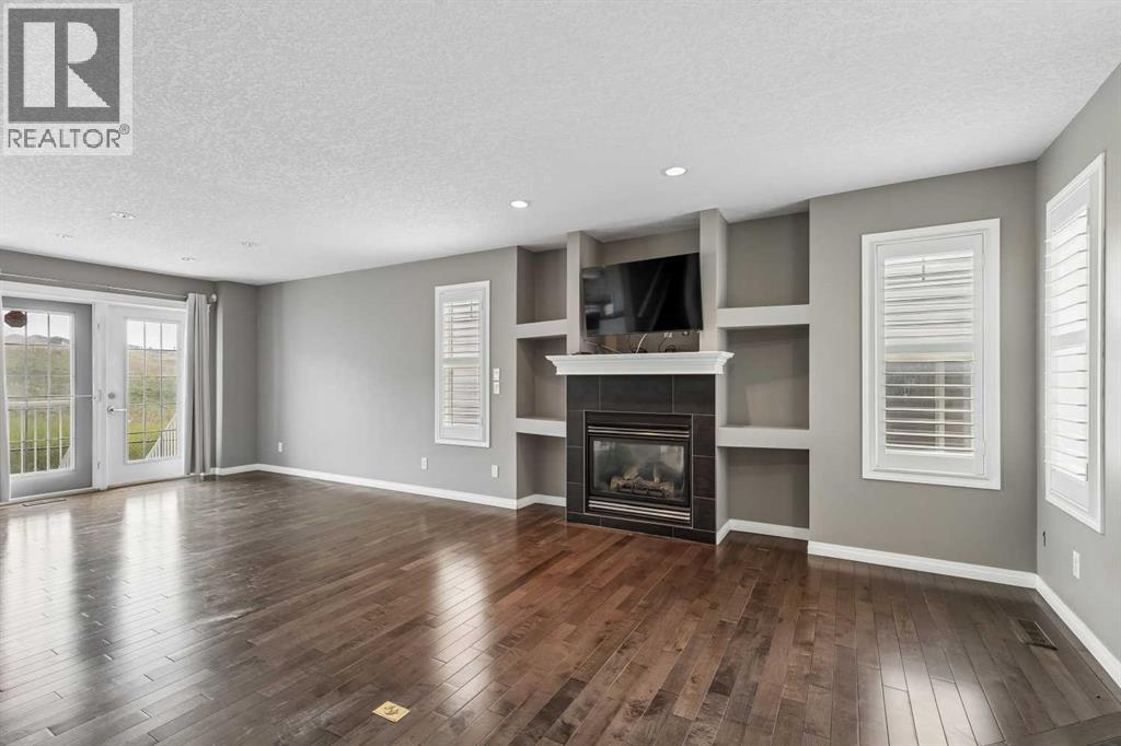 139 Hidden Creek Gardens NW, Calgary, Alberta  T3A 6J4 - Photo 5 - A2335481