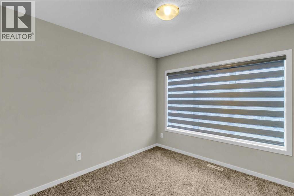249 Aquila Drive NW, Calgary, Alberta  T3R 1Y6 - Photo 10 - A2335180