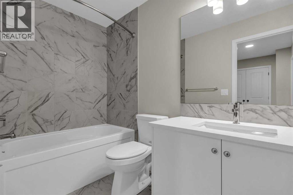 249 Aquila Drive NW, Calgary, Alberta  T3R 1Y6 - Photo 12 - A2335180
