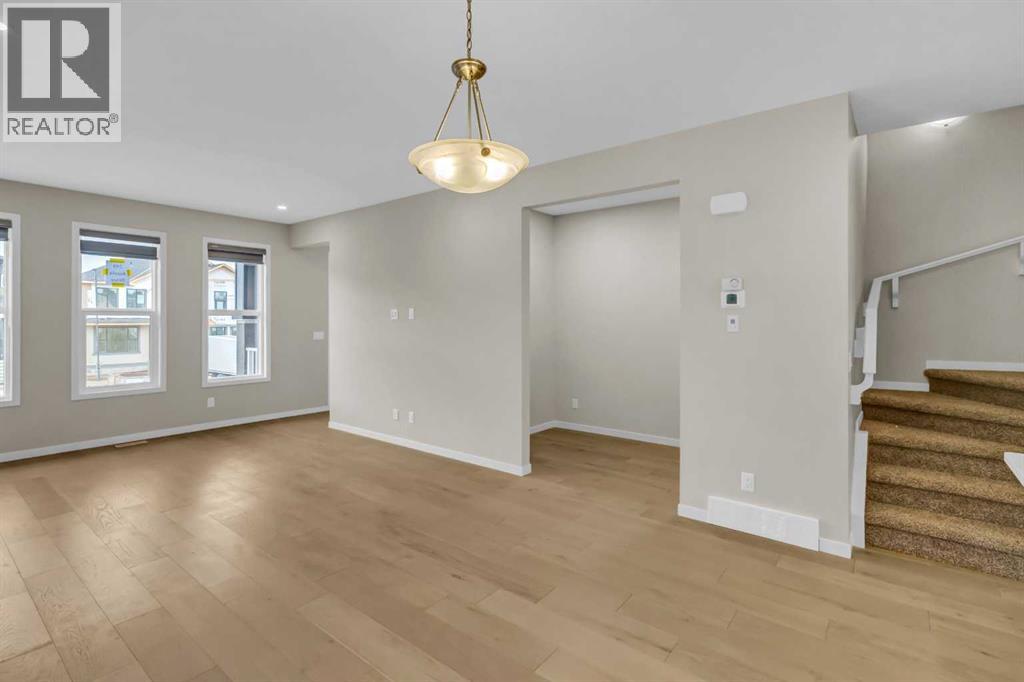 249 Aquila Drive NW, Calgary, Alberta  T3R 1Y6 - Photo 4 - A2335180