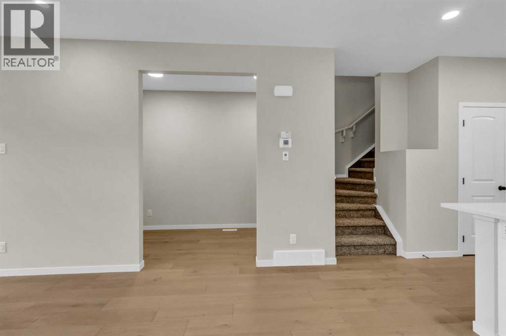249 Aquila Drive NW, Calgary, Alberta  T3R 1Y6 - Photo 8 - A2335180