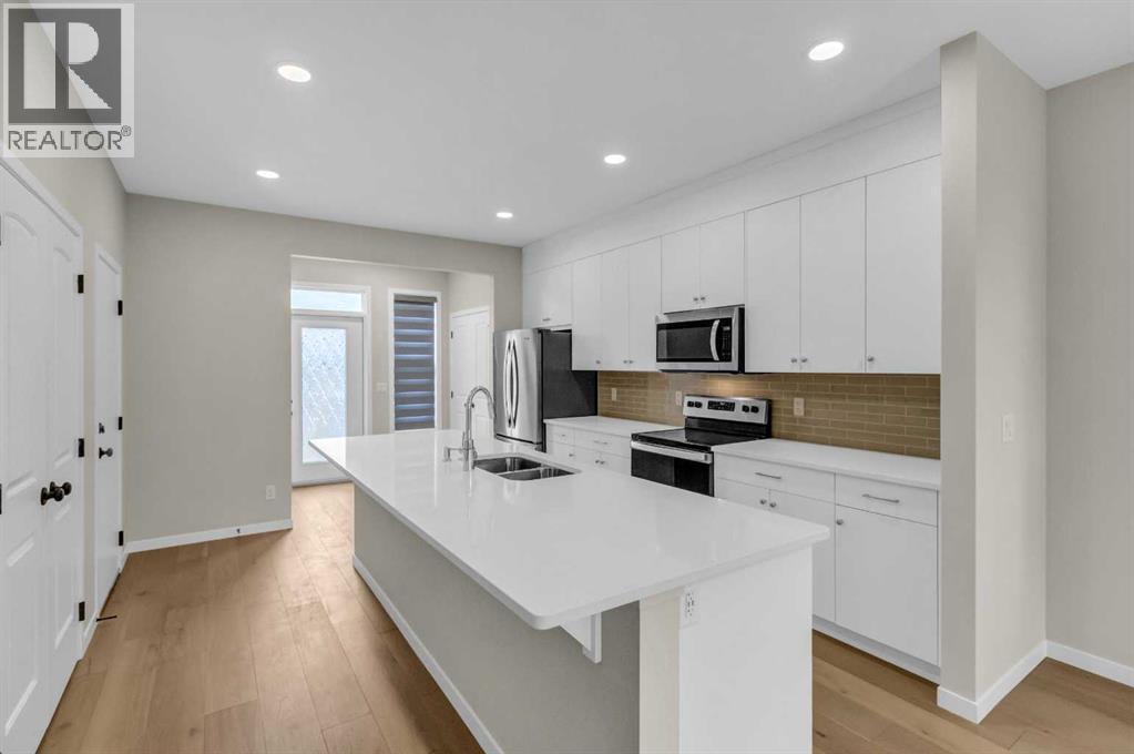 249 Aquila Drive NW, Calgary, Alberta  T3R 1Y6 - Photo 9 - A2335180
