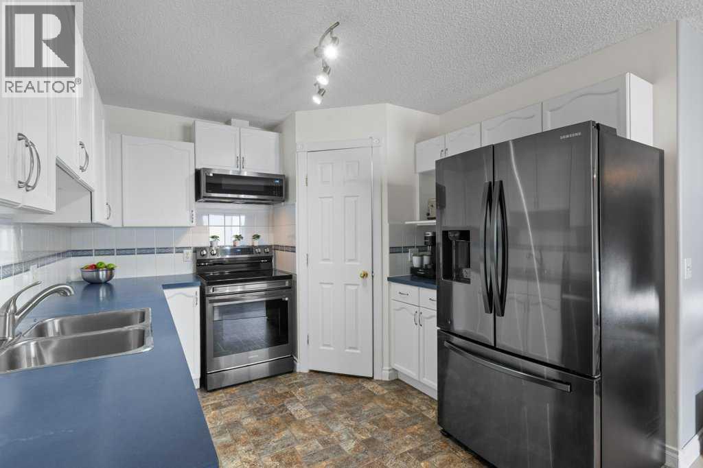 202 Willowbrook Close Nw, Airdrie, Alberta  T4B 2J7 - Photo 10 - A2331814