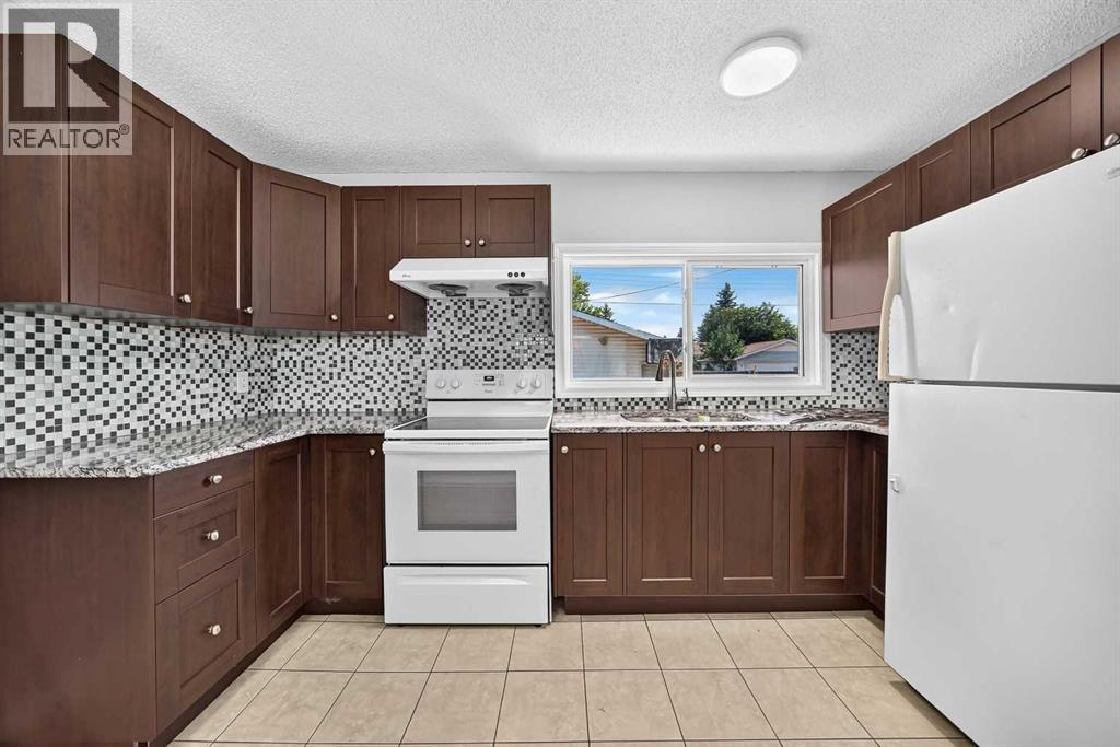 80 Pensville Road SE, Calgary, Alberta  T2A 4K5 - Photo 3 - A2335025