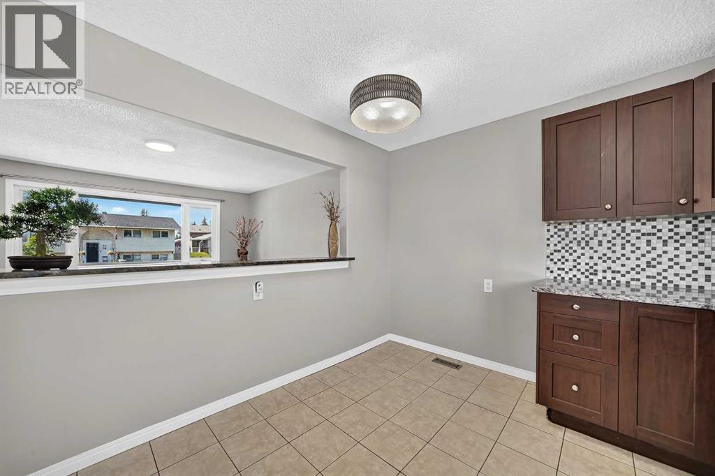 80 Pensville Road SE, Calgary, Alberta  T2A 4K5 - Photo 5 - A2335025