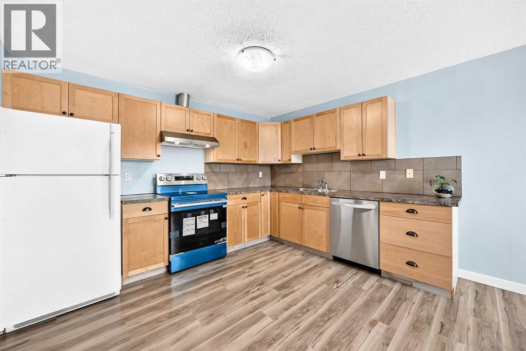 32 Macewan Park Link NW, Calgary, Alberta  T3K 3E8 - Photo 5 - A2333588