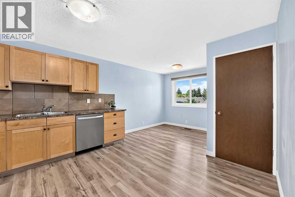 32 Macewan Park Link NW, Calgary, Alberta  T3K 3E8 - Photo 6 - A2333588