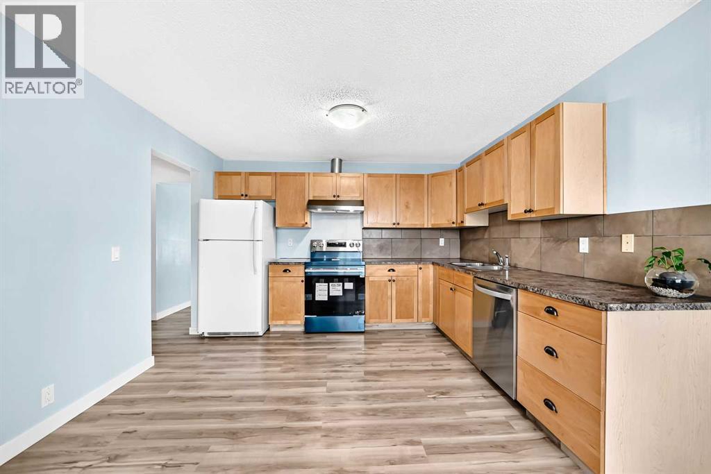 32 Macewan Park Link NW, Calgary, Alberta  T3K 3E8 - Photo 4 - A2333588