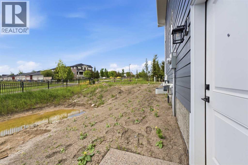 75 Sunvalley Way, Cochrane, Alberta  T4C 0X8 - Photo 31 - A2324347