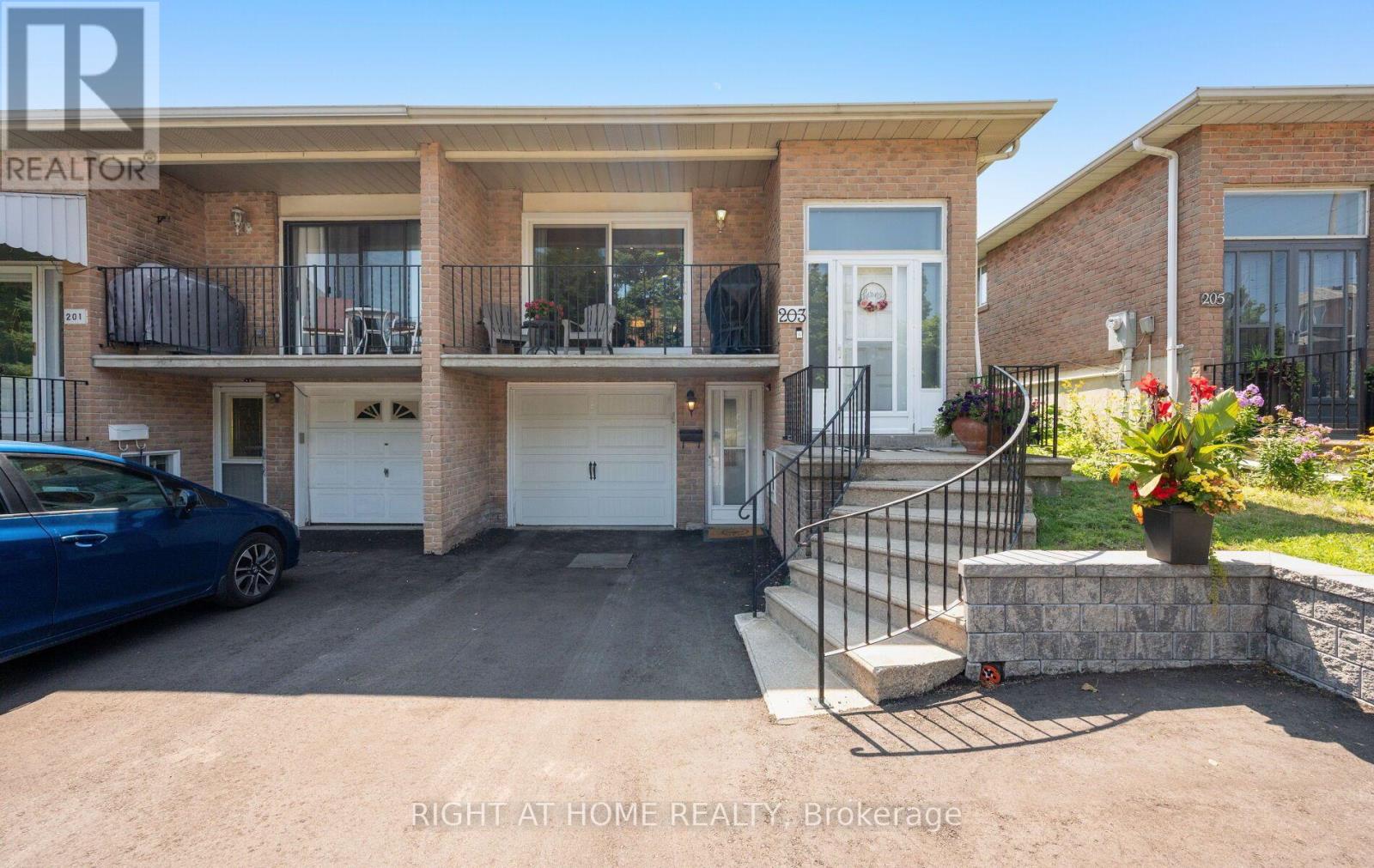<div class="slider-price">$888,000</div><p>203 Robert Hicks Drive, Toronto, Ontario</p>