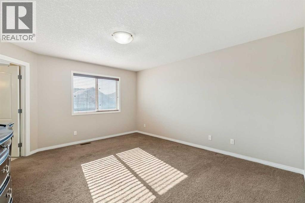 92 Cougar Ridge Close SW, Calgary, Alberta  T3H 0V4 - Photo 23 - A2334290