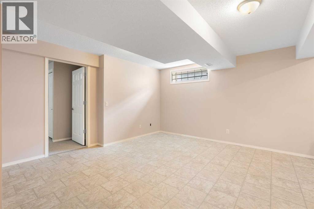 77 Tararidge Circle NE, Calgary, Alberta  T3J 3W4 - Photo 18 - A2334497