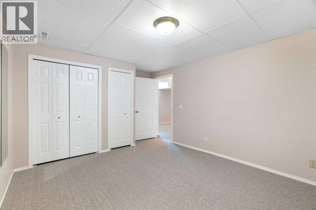 77 Tararidge Circle NE, Calgary, Alberta  T3J 3W4 - Photo 22 - A2334497