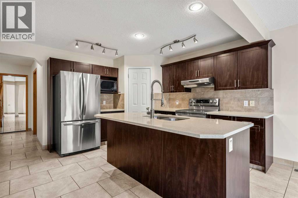 115 Macewan Park Circle, Calgary, Alberta  T3K 4A3 - Photo 10 - A2331751