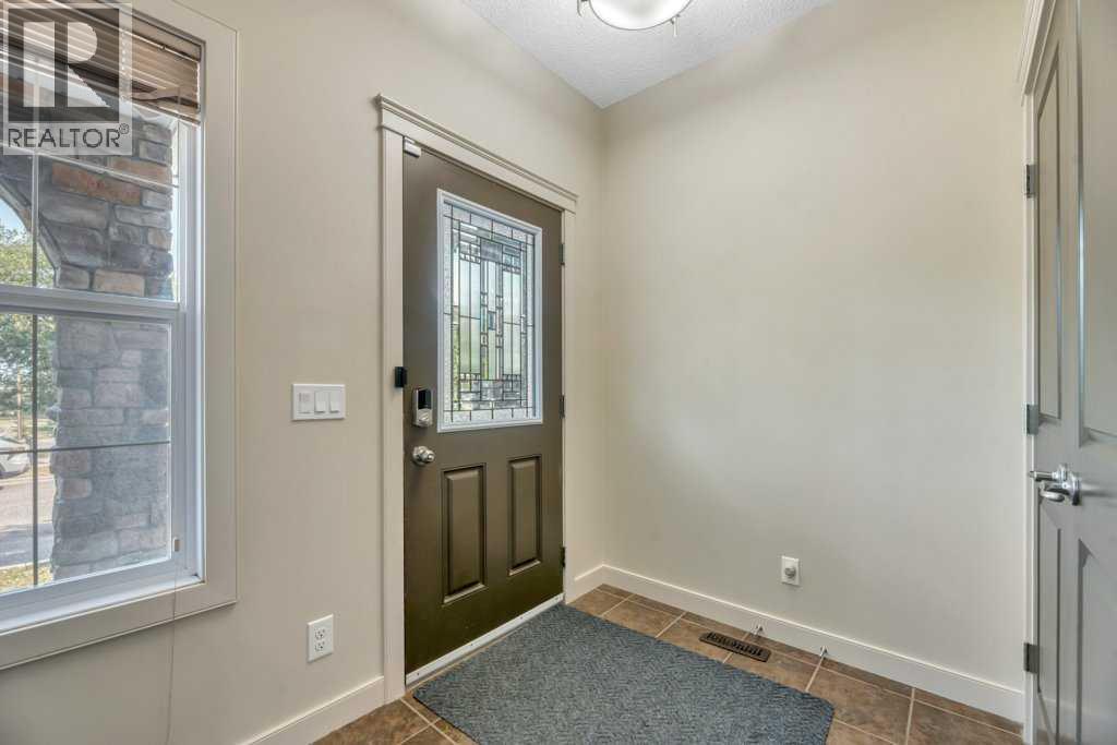 10 Ravenskirk Close SE, Airdrie, Alberta  T4A 0K7 - Photo 9 - A2335167