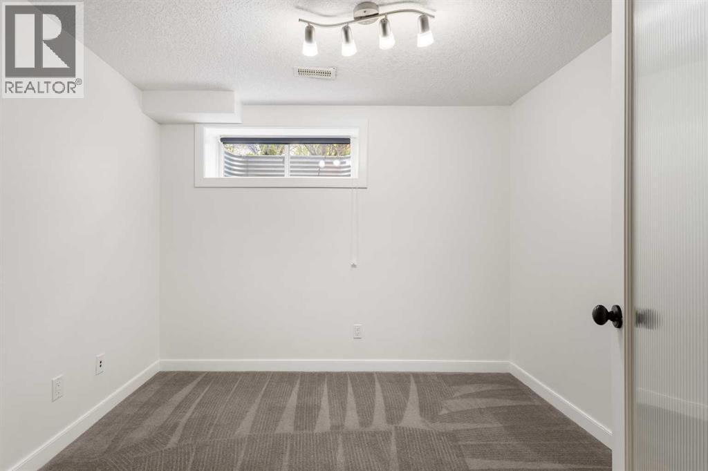66 Everhollow Avenue Sw, Calgary, Alberta  T2Y 0A9 - Photo 35 - A2320895