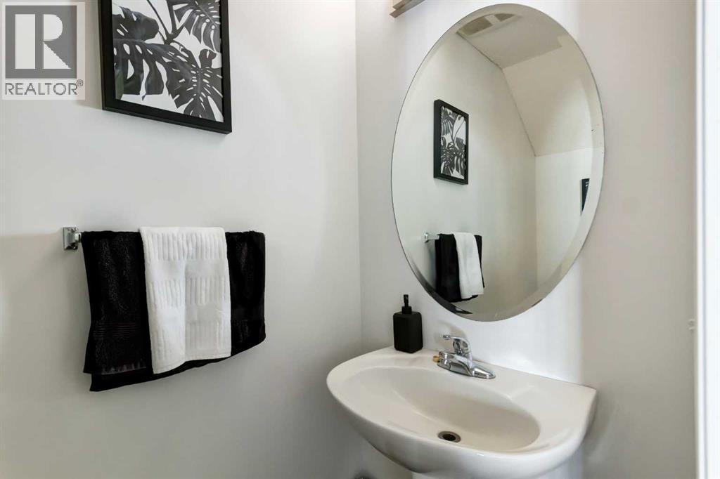 3240 New Brighton Gardens SE, Calgary, Alberta  T2Z 0A3 - Photo 11 - A2335117