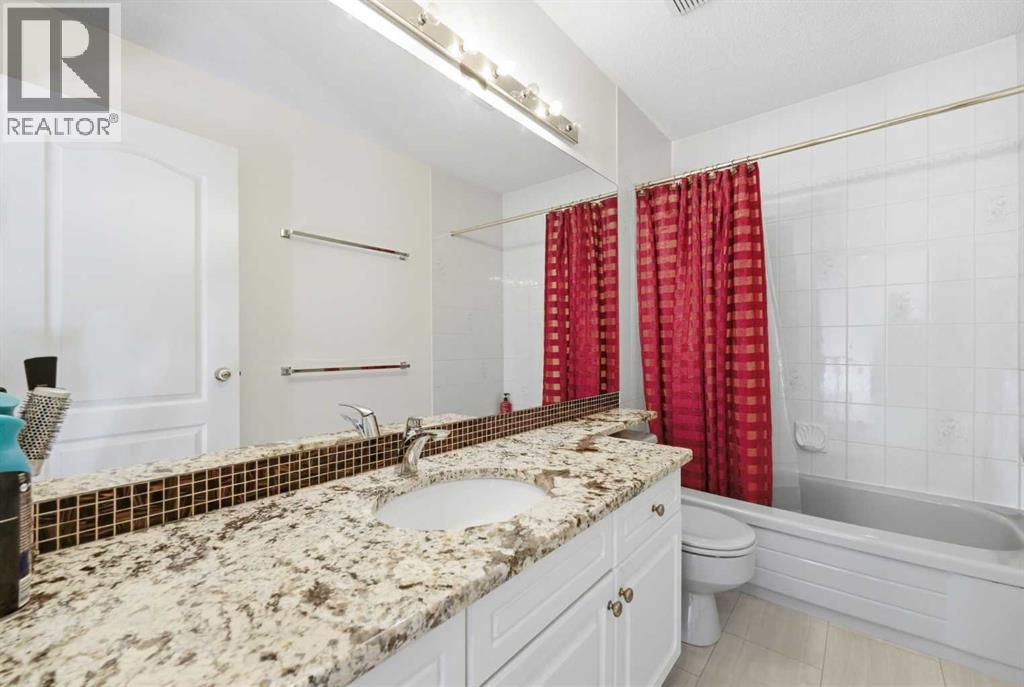 71 Woodpark Close SW, Calgary, Alberta  T2W 6G9 - Photo 23 - A2329700