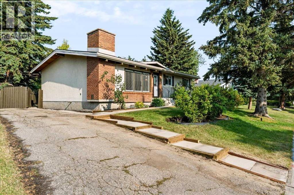 10827 Brae Road SW, Calgary, Alberta  T2W 1E2 - Photo 3 - A2335111