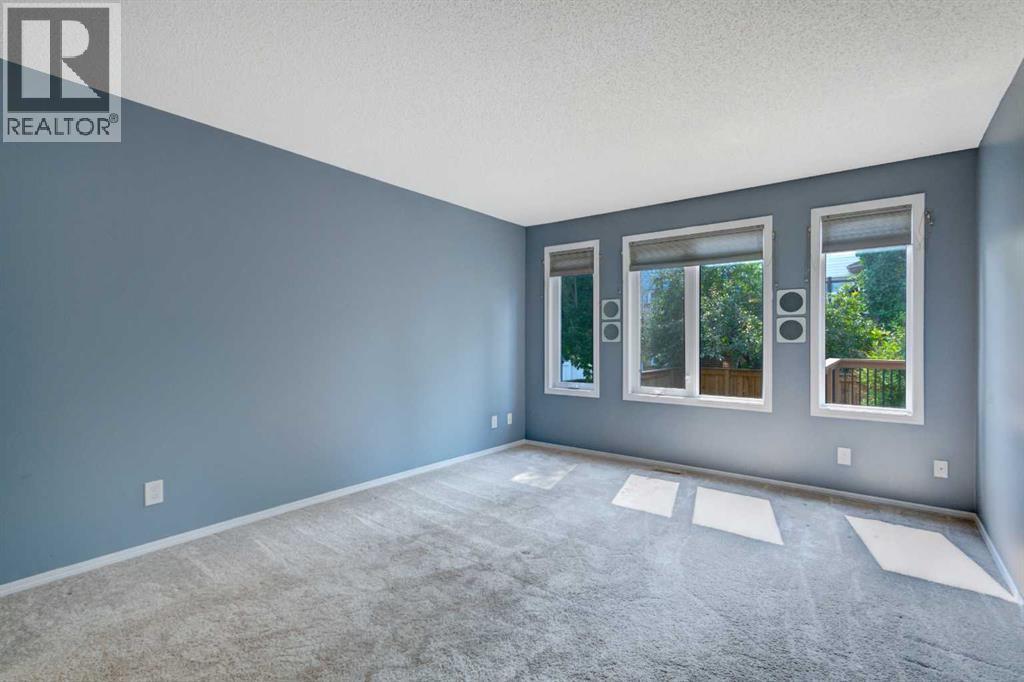 411 Shawinigan Drive SW, Calgary, Alberta  T2Y 3A2 - Photo 12 - A2330883