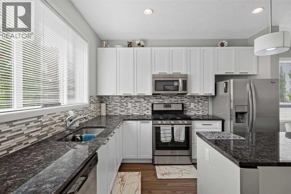 202 Copperpond Row SE, Calgary, Alberta  T2Z 1H3 - Photo 7 - A2335202