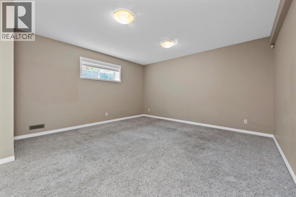 203 Morningside Circle SW, Airdrie, Alberta  T4B 0L7 - Photo 36 - A2317726