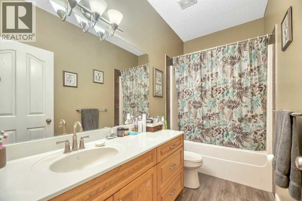 133 Oakmere Point, Chestermere, Alberta  T1X 1M8 - Photo 37 - A2325404