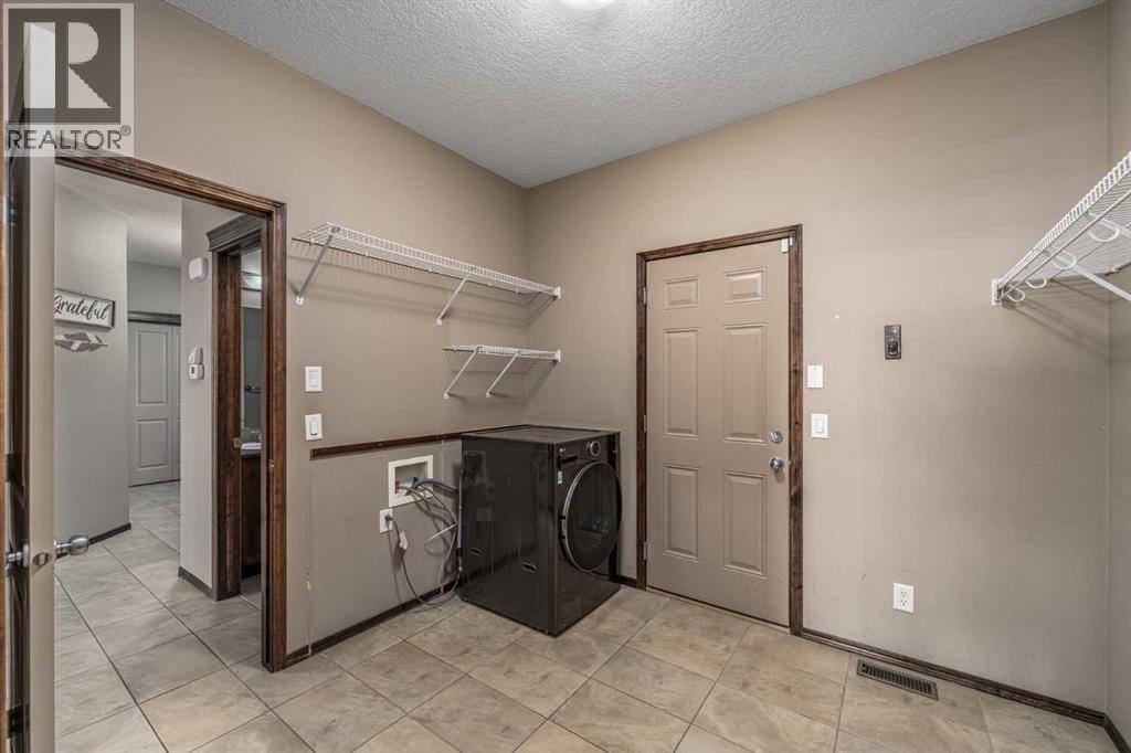 173 Pantego Road NW, Calgary, Alberta  T3K 0B8 - Photo 13 - A2334399