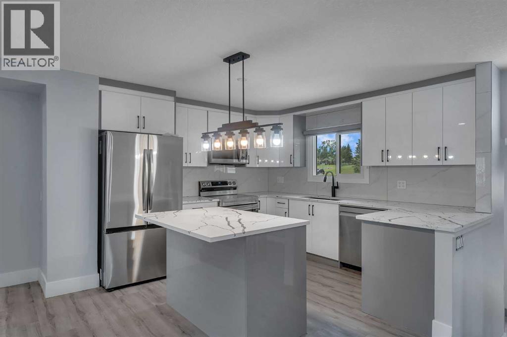 2930 Oakmoor Crescent SW, Calgary, Alberta T2V 3Z7 - Photo 9 - A2335752