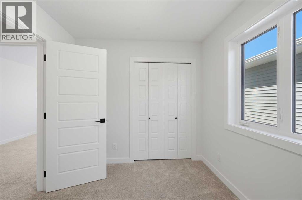 8557 Huxbury Drive, Calgary, Alberta  T2A 4Y1 - Photo 36 - A2318845