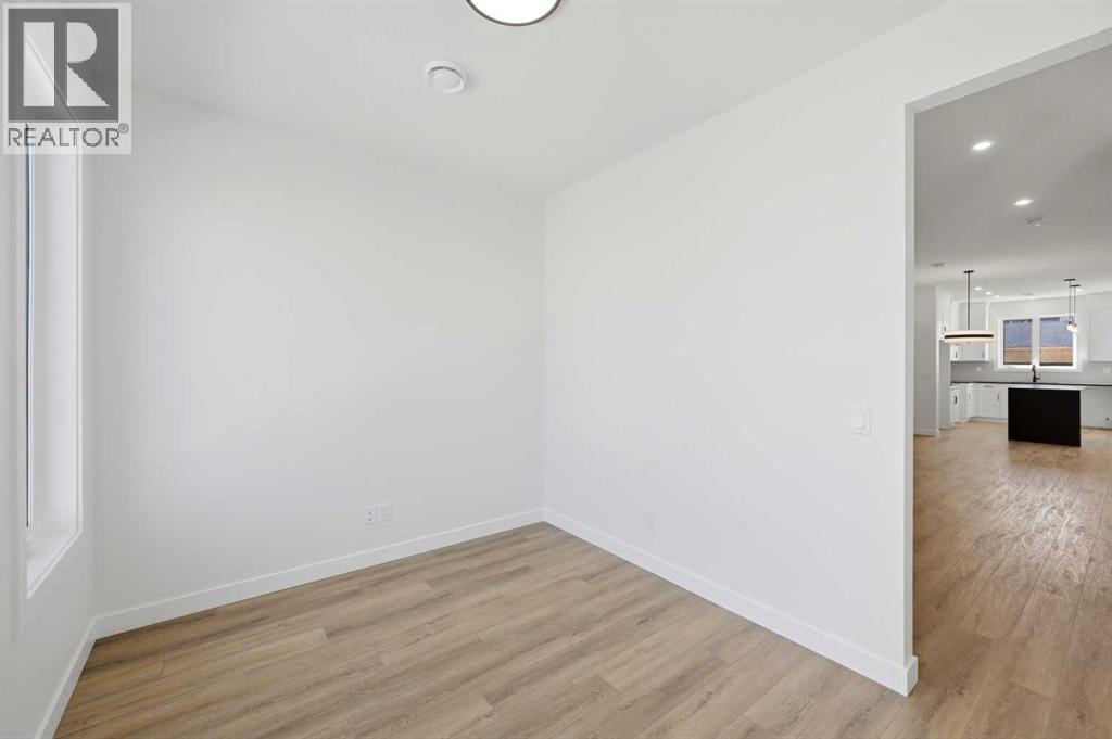 8557 Huxbury Drive, Calgary, Alberta  T2A 4Y1 - Photo 12 - A2318845