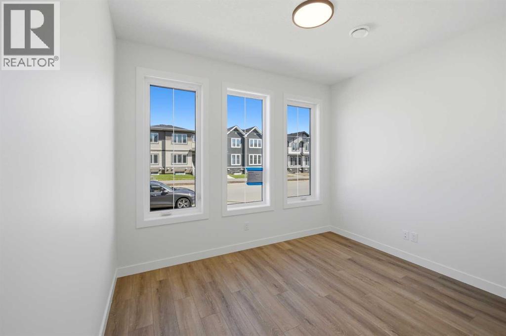 8557 Huxbury Drive, Calgary, Alberta  T2A 4Y1 - Photo 11 - A2318845