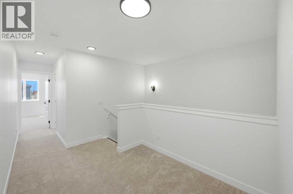 8557 Huxbury Drive, Calgary, Alberta  T2A 4Y1 - Photo 28 - A2318845