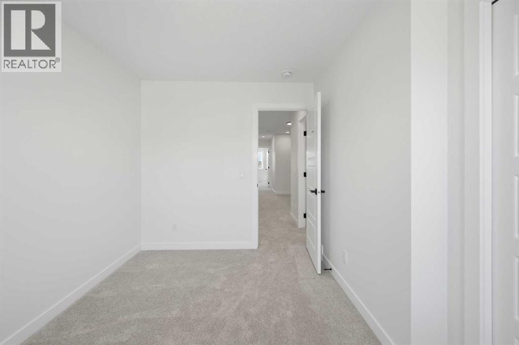 8557 Huxbury Drive, Calgary, Alberta  T2A 4Y1 - Photo 43 - A2318845