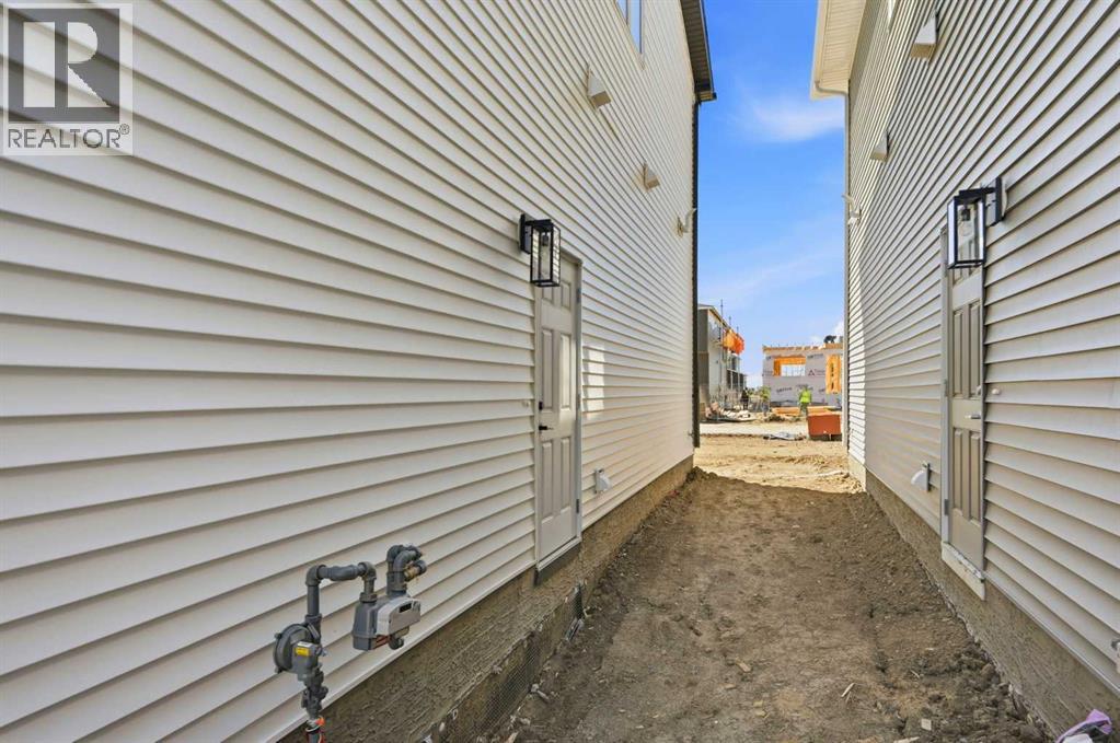 8557 Huxbury Drive, Calgary, Alberta  T2A 4Y1 - Photo 47 - A2318845