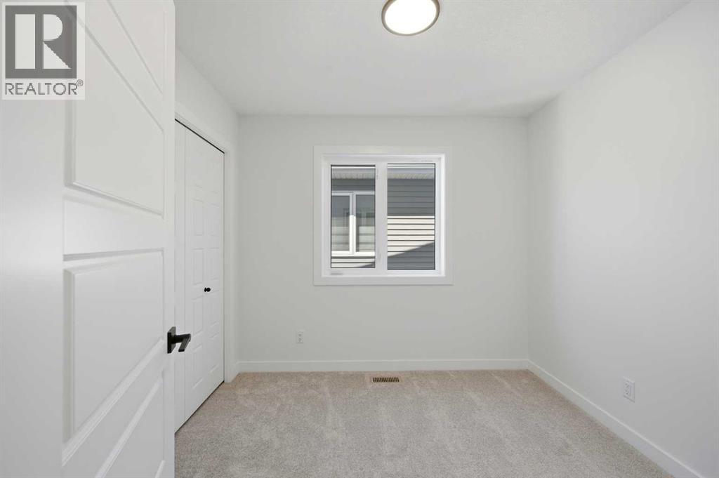 8557 Huxbury Drive, Calgary, Alberta  T2A 4Y1 - Photo 35 - A2318845