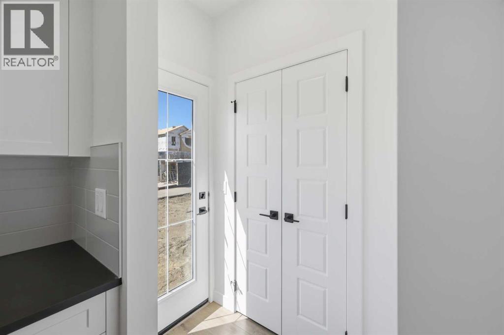 8557 Huxbury Drive, Calgary, Alberta  T2A 4Y1 - Photo 24 - A2318845