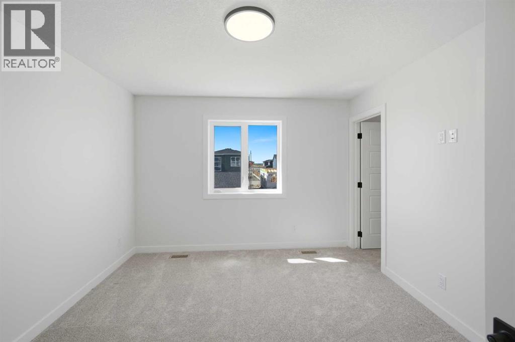 8557 Huxbury Drive, Calgary, Alberta  T2A 4Y1 - Photo 30 - A2318845