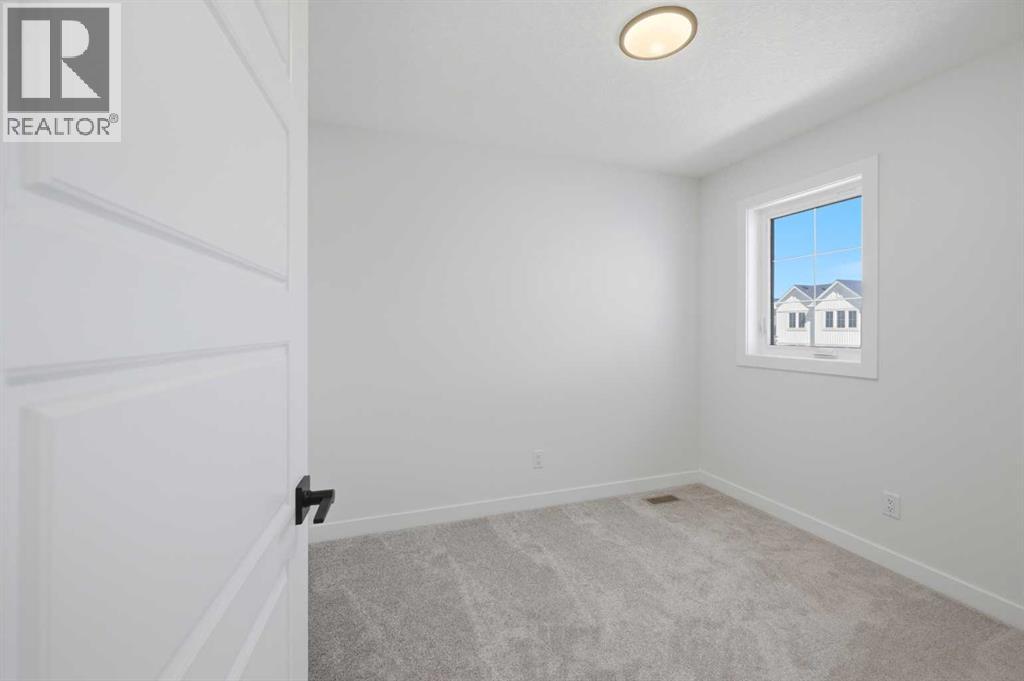 8557 Huxbury Drive, Calgary, Alberta  T2A 4Y1 - Photo 39 - A2318845
